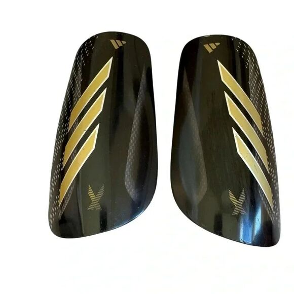 ADIDAS X LEAGUE SHIN GUARD (BLACK/NIGHT GREY/MATTE GOLD) SZ L (10-12) - Picture 1 of 3
